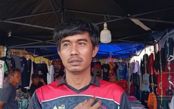 Pedagang Kaos Penas Bidik Lonjakan Omzet dari Ribuan Peserta