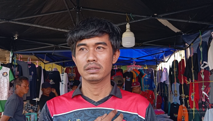Pedagang Kaos Penas Bidik Lonjakan Omzet dari Ribuan Peserta